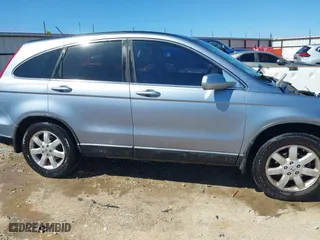 2008 Honda CR-V EX-L with VIN JHLRE38788C030498, listed as a IAAI auction lot 41761233 with 214,418 mi miles. Bid and sale history available at carsss.com. Image 14.