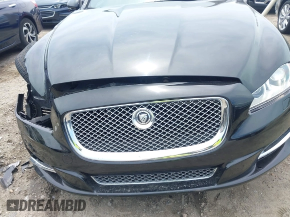 2011 Jaguar XJ with VIN SAJWA1CB3BLV07259, listed as a IAAI auction lot 42108497 with 90,498 mi miles and . Bid and sale history available at DreamBid. Image 19.