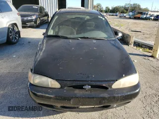 1999 Ford Escort LX with VIN 1FAFP10P5XW277376, listed as a Copart auction lot 82148204 with 127,634 mi miles and Salvage Title. Bid and sale history available at carsss.com. Image 5.