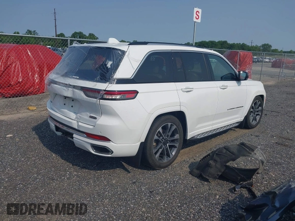 2022 Jeep Grand Cherokee Overland with VIN 1C4RJHDGXN8576813, listed as a IAAI auction lot 42314919 with 35,632 mi miles and . Bid and sale history available at DreamBid. Image 4.