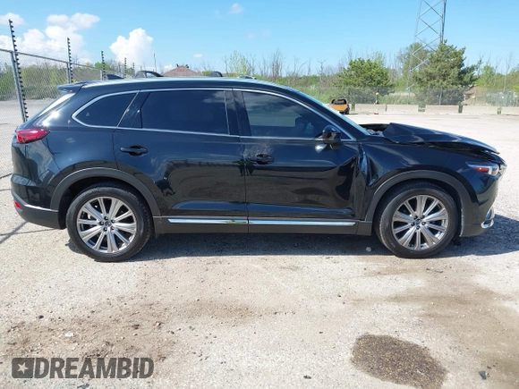 2021 Mazda CX-9 Signature with VIN JM3TCBEY1M0539786, listed as a IAAI auction lot 42264611 with 51,168 mi miles and . Bid and sale history available at DreamBid. Image 13.
