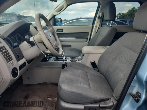 2009 Ford Escape Hybrid with VIN 1FMCU59309KB77043, listed as a Copart auction lot 63925395 with 201,171 mi miles and Clean title. Bid and sale history available at DreamBid. Image 7.