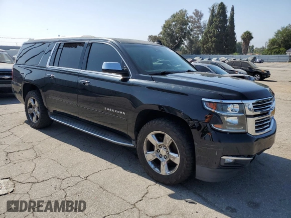 2017 Chevrolet Suburban Premier with VIN 1GNSCJKC8HR226797, listed as a Copart auction lot 62874585 with 150,994 mi miles and Salvage title. Bid and sale history available at DreamBid. Image 4.