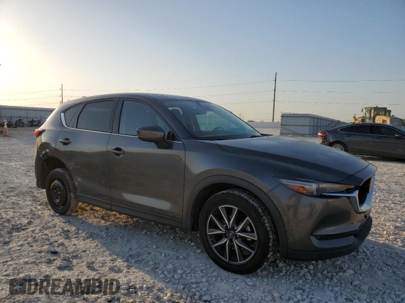 2017 Mazda CX-5 Grand Touring with VIN JM3KFBDL1H0148961, listed as a Copart auction lot 52648115 with 171,767 mi miles and Salvage Title. Bid and sale history available at carsss.com. Image 4.
