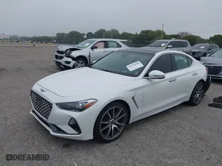 2020 Genesis G70 2.0T with VIN KMTG44LA8LU064798, listed as a IAAI auction lot 41878098 with 57,995 mi miles. Bid and sale history available at carsss.com. Image 2.