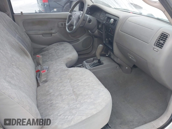 2003 Toyota Tacoma with VIN 5TENL42N63Z199086, listed as a IAAI auction lot 42084151 with 153,977 mi miles and . Bid and sale history available at DreamBid. Image 5.
