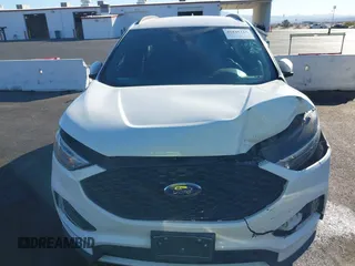 2020 Ford Edge SEL z VIN 2FMPK3J92LBB53467, wystawiony jako IAAI lot #41241115 z przebiegiem 58 183 mil mil oraz . Historia ofert i sprzedaży dostępna na DreamBid. Obrazek 12.