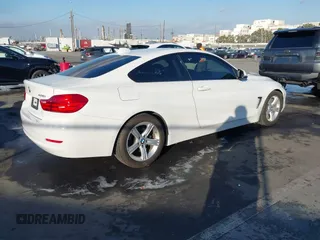 2014 BMW 4 Series 428i with VIN WBA3N7C50EF718812, listed as a IAAI auction lot 41349128 with 67,581 mi miles and . Bid and sale history available at carsss.com. Image 4.