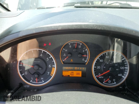 2012 Nissan Titan SV with VIN 1N6BA0ED1CN323589, listed as a Copart auction lot 62068904 with 148,354 mi miles and Salvage Title. Bid and sale history available at DreamBid. Image 9.