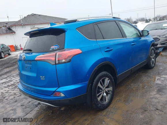2017 Toyota RAV4 XLE with VIN 2T3RFREV2HW693031, listed as a IAAI auction lot 41671812 with 82,190 mi miles. Bid and sale history available at carsss.com. Image 4.