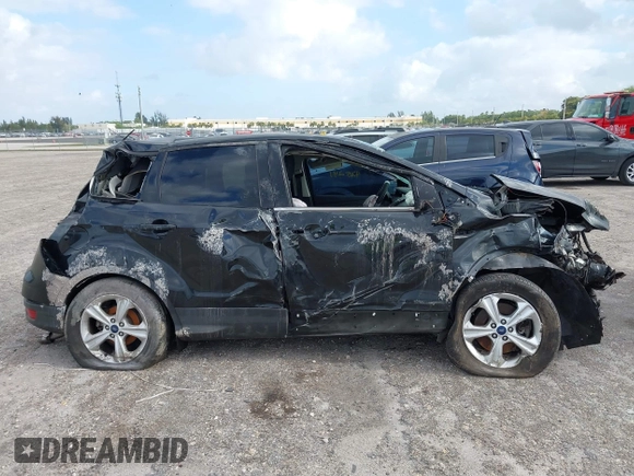 2015 Ford Escape SE with VIN 1FMCU0G98FUA80408, listed as a IAAI auction lot 41955818 with 129,908 mi miles. Bid and sale history available at carsss.com. Image 14.