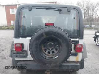 2006 Jeep Wrangler X with VIN 1J4FA39SX6P709588, listed as a IAAI auction lot 41927435 with 227,990 mi miles. Bid and sale history available at carsss.com. Image 16.