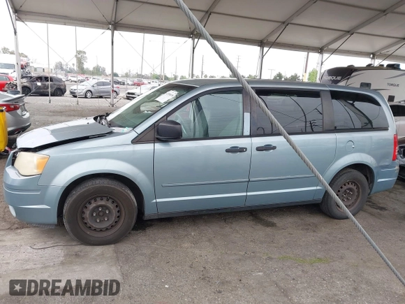 2008 Chrysler Town & Country LX with VIN 2A8HR44H38R831695, listed as a IAAI auction lot 42096656 with 254,424 mi miles and . Bid and sale history available at carsss.com. Image 14.