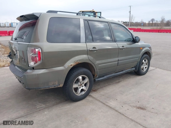 2007 Honda Pilot EX-L with VIN 2HKYF18767H538207, listed as a IAAI auction lot 41747624 with 214,026 mi miles. Bid and sale history available at carsss.com. Image 4.