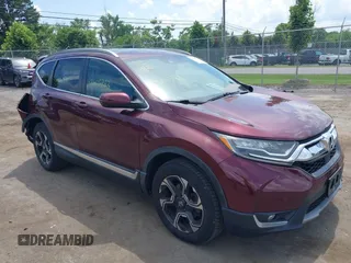 2018 Honda CR-V Touring z VIN 2HKRW2H9XJH603529, wystawiony jako IAAI lot #42608783 z przebiegiem 106 741 mil mil oraz . Historia ofert i sprzedaży dostępna na DreamBid. Obrazek 1.