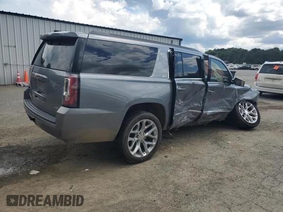 2019 GMC Yukon XL SLT z VIN 1GKS1GKC0KR325305, wystawiony jako Copart lot #56219325 z przebiegiem 136 295 mil mil oraz Szkoda całkowita • Salvage title. Historia ofert i sprzedaży dostępna na DreamBid. Obrazek 3.
