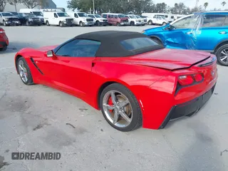 2015 Chevrolet Corvette 1LT with VIN 1G1YB3D7XF5124917, listed as a IAAI auction lot 41567848 with 104,886 mi miles. Bid and sale history available at carsss.com. Image 3.