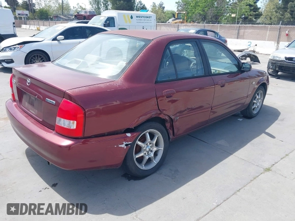 2002 Mazda Protege DX with VIN JM1BJ225621608984, listed as a IAAI auction lot 42106167 with 158,662 mi miles and . Bid and sale history available at DreamBid. Image 4.