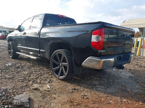 2014 Toyota Tundra 2WD Truck SR with VIN 5TFRM5F1XEX074579, listed as a IAAI auction lot 41540661 with 132,505 mi miles. Bid and sale history available at carsss.com. Image 3.