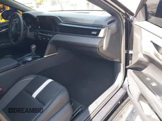 2025 Toyota Camry LE with VIN 4T1DAACK8SU125496, listed as a IAAI auction lot 42206200 with 937 mi miles and . Bid and sale history available at DreamBid. Image 5.