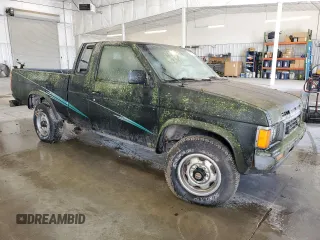 1986 Nissan Hardbody E z VIN 1N6ND16Y7GC413942, wystawiony jako Copart lot #57677605 z przebiegiem 126 183 mil mil oraz Tytuł czysty. Historia ofert i sprzedaży dostępna na DreamBid. Obrazek 4.