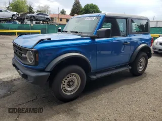 2021 Ford Bronco с VIN 1FMDE5AH2MLA76856, выставлен на аукционе Copart как лот 64621955 с пробегом 27 830 миль миль и Списание • Salvage title. История ставок и продаж доступна на DreamBid. Изображение 1.