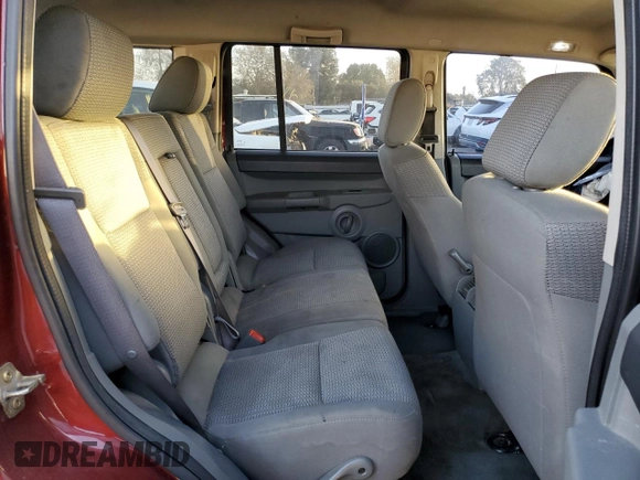 2007 Jeep Commander Sport z VIN 1J8HG48P17C601121, wystawiony jako Copart lot #41482495 z przebiegiem 199 263 mil mil oraz Szkoda całkowita • Salvage title. Historia ofert i sprzedaży dostępna na DreamBid. Obrazek 11.