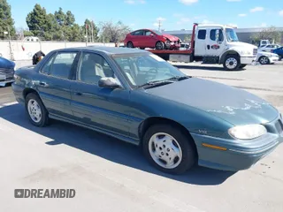 1998 Pontiac Grand Am SE with VIN 1G2NE52M2WC712123, listed as a IAAI auction lot 41939392 with 307,145 mi miles. Bid and sale history available at carsss.com. Image 1.