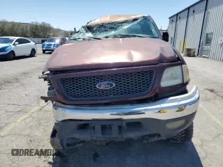 2001 Ford F-150 XLT with VIN 1FTRW08L31KE43205, listed as a Copart auction lot 56141495 with Not provided miles and Non repairable. Bid and sale history available at DreamBid. Image 5.