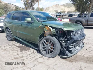 2021 Dodge Durango GT z VIN 1C4RDJDGXMC766122, wystawiony jako IAAI lot #40970231 z przebiegiem 100 947 mil mil oraz . Historia ofert i sprzedaży dostępna na DreamBid. Obrazek 1.