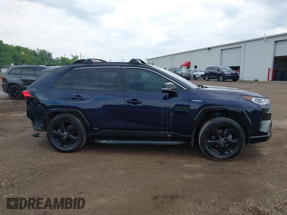 2021 Toyota RAV4 Hybrid XSE with VIN 4T3E6RFV0MU053245, listed as a IAAI auction lot 42426959 with 28,717 mi miles and . Bid and sale history available at DreamBid. Image 13.