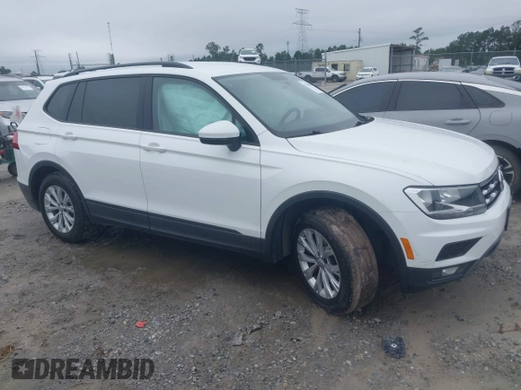 2018 Volkswagen Tiguan S with VIN 3VV1B7AX1JM032250, listed as a IAAI auction lot 42366790 with 65,406 mi miles and . Bid and sale history available at DreamBid. Image 13.