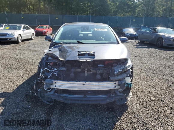 2021 Toyota Prius LE with VIN JTDKAMFP7M3185847, listed as a Copart auction lot 52897465 with 58,996 mi miles and Salvage Title. Bid and sale history available at DreamBid. Image 5.