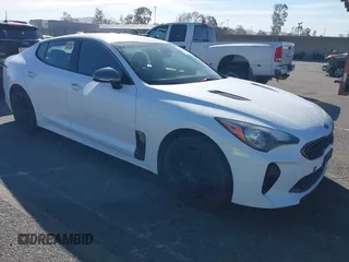 2021 Kia Stinger GT-Line with VIN KNAE15LA5M6088516, listed as a IAAI auction lot 41626750 with 85,152 mi miles. Bid and sale history available at carsss.com. Image 1.