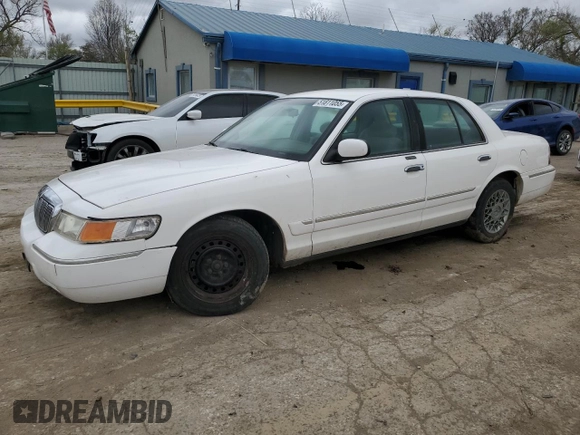 1999 Mercury Grand Marquis GS z VIN 2MEFM74W0XX670924, wystawiony jako Copart lot #51811055 z przebiegiem 176 559 mil mil oraz Szkoda całkowita • Salvage title. Historia ofert i sprzedaży dostępna na DreamBid. Obrazek 1.
