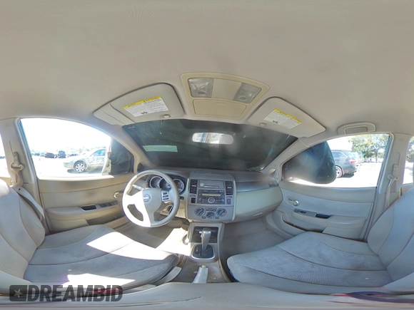2007 Nissan Versa 1.8 SL with VIN 3N1BC11E27L432802, listed as a Copart auction lot 71018594 with 118,795 mi miles and Salvage Title. Bid and sale history available at carsss.com. Image 13.