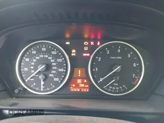 2010 BMW 5 Series 528i with VIN WBANU5C56AC127797, listed as a IAAI auction lot 42128290 with 137,578 mi miles and . Bid and sale history available at carsss.com. Image 7.