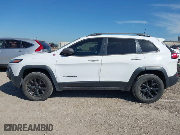 2017 Jeep Cherokee Trailhawk L Plus with VIN 1C4PJMBS3HD227978, listed as a IAAI auction lot 42242791 with 76,982 mi miles and . Bid and sale history available at DreamBid. Image 14.