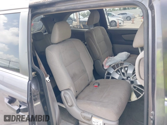 2016 Honda Odyssey LX with VIN 5FNRL5H27GB003250, listed as a IAAI auction lot 42103335 with 151,516 mi miles and . Bid and sale history available at DreamBid. Image 8.
