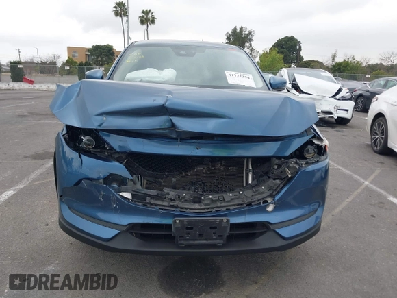 2017 Mazda CX-5 Sport with VIN JM3KFABL9H0142189, listed as a IAAI auction lot 41722354 with 109,865 mi miles. Bid and sale history available at carsss.com. Image 6.