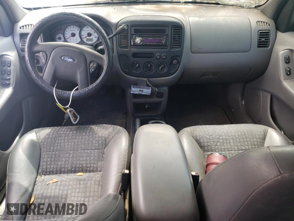 2002 Ford Escape XLS Choice with VIN 1FMYU011X2KB24469, listed as a Copart auction lot 76462504 with Not provided miles and Salvage title. Bid and sale history available at DreamBid. Image 8.