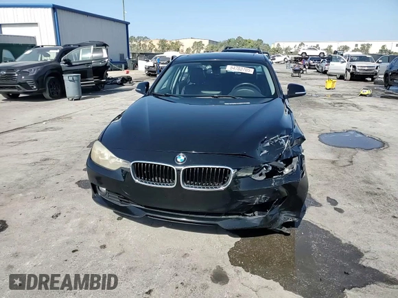 2015 BMW 3 Series 328i with VIN WBA3A5C57FP605385, listed as a Copart auction lot 54703705 with 129,294 mi miles and Salvage title. Bid and sale history available at DreamBid. Image 13.