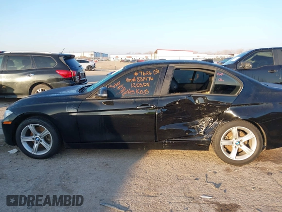 2015 BMW 3 Series 320i with VIN WBA3B1C53FP831476, listed as a IAAI auction lot 41219821 with 108,852 mi miles. Bid and sale history available at carsss.com. Image 14.