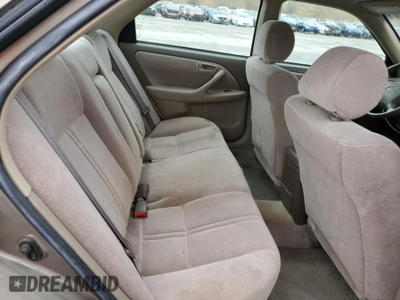 1999 Toyota Camry LE z VIN 4T1BF28K6XU077804, wystawiony jako Copart lot #51485495 z przebiegiem 124 273 mil mil oraz Szkoda całkowita • Salvage title. Historia ofert i sprzedaży dostępna na DreamBid. Obrazek 10.