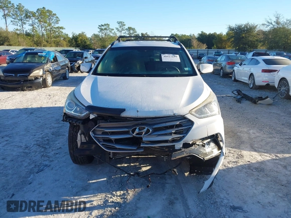 2017 Hyundai Santa Fe 2.4L z VIN 5XYZU3LB4HG435992, wystawiony jako IAAI lot #40927607 z przebiegiem 104 868 mil mil oraz . Historia ofert i sprzedaży dostępna na DreamBid. Obrazek 13.