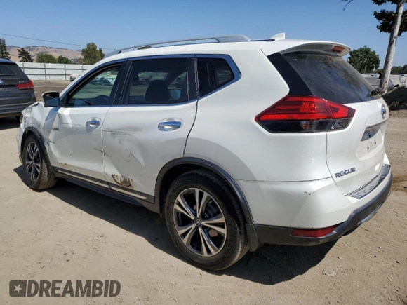 2017 Nissan Rogue SL with VIN 5N1AT2MT3HC751952, listed as a Copart auction lot 60842915 with 75,606 mi miles and Salvage title. Bid and sale history available at DreamBid. Image 2.