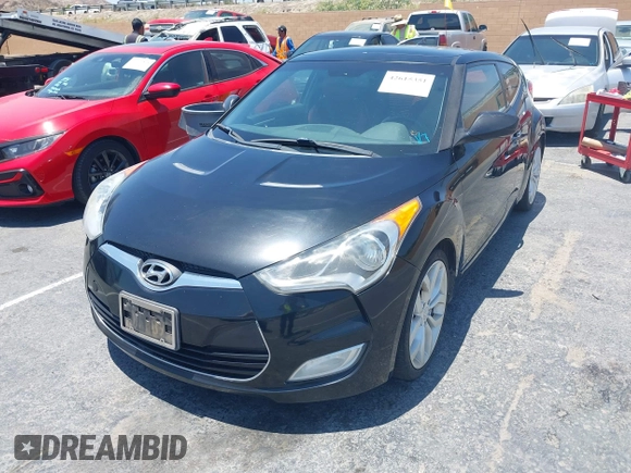 2013 Hyundai Veloster w/Gray Int with VIN KMHTC6AD2DU140750, listed as a IAAI auction lot 42615351 with 191,873 mi miles and . Bid and sale history available at DreamBid. Image 2.