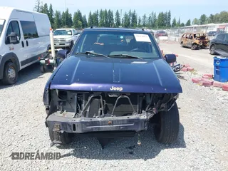 1997 Jeep Grand Cherokee Limited с VIN 1J4GZ78YXVC549289, выставлен на аукционе IAAI как лот 42474073 с пробегом 265 188 миль миль и . История ставок и продаж доступна на DreamBid. Изображение 13.
