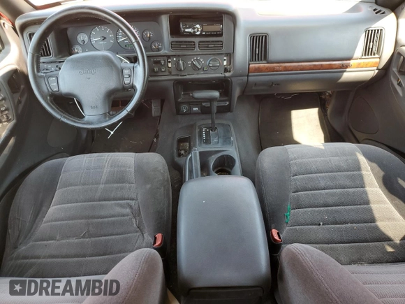 1997 Jeep Grand Cherokee TSi with VIN 1J4FX58SXVC545910, listed as a Copart auction lot 73142554 with 180,896 mi miles and Salvage Title. Bid and sale history available at carsss.com. Image 8.