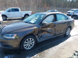 2014 Volkswagen Jetta Sedan SE w/Connectivity with VIN 3VWD07AJ1EM361255, listed as a IAAI auction lot 41385849 with 166,124 mi miles. Bid and sale history available at carsss.com. Image 6.